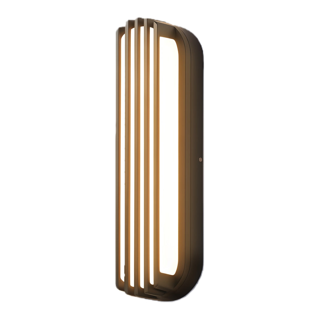 Vertical brushed-gold wall-mounted linear lighting with curved edges and soft warm output.