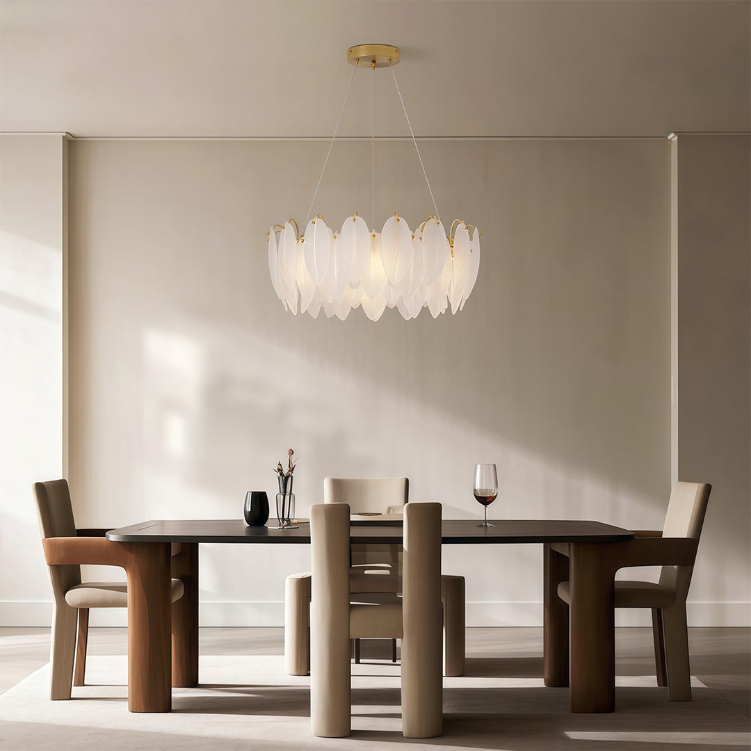 Feather chandeliers featuring brushed nickel with symmetrical glass leaf pattern