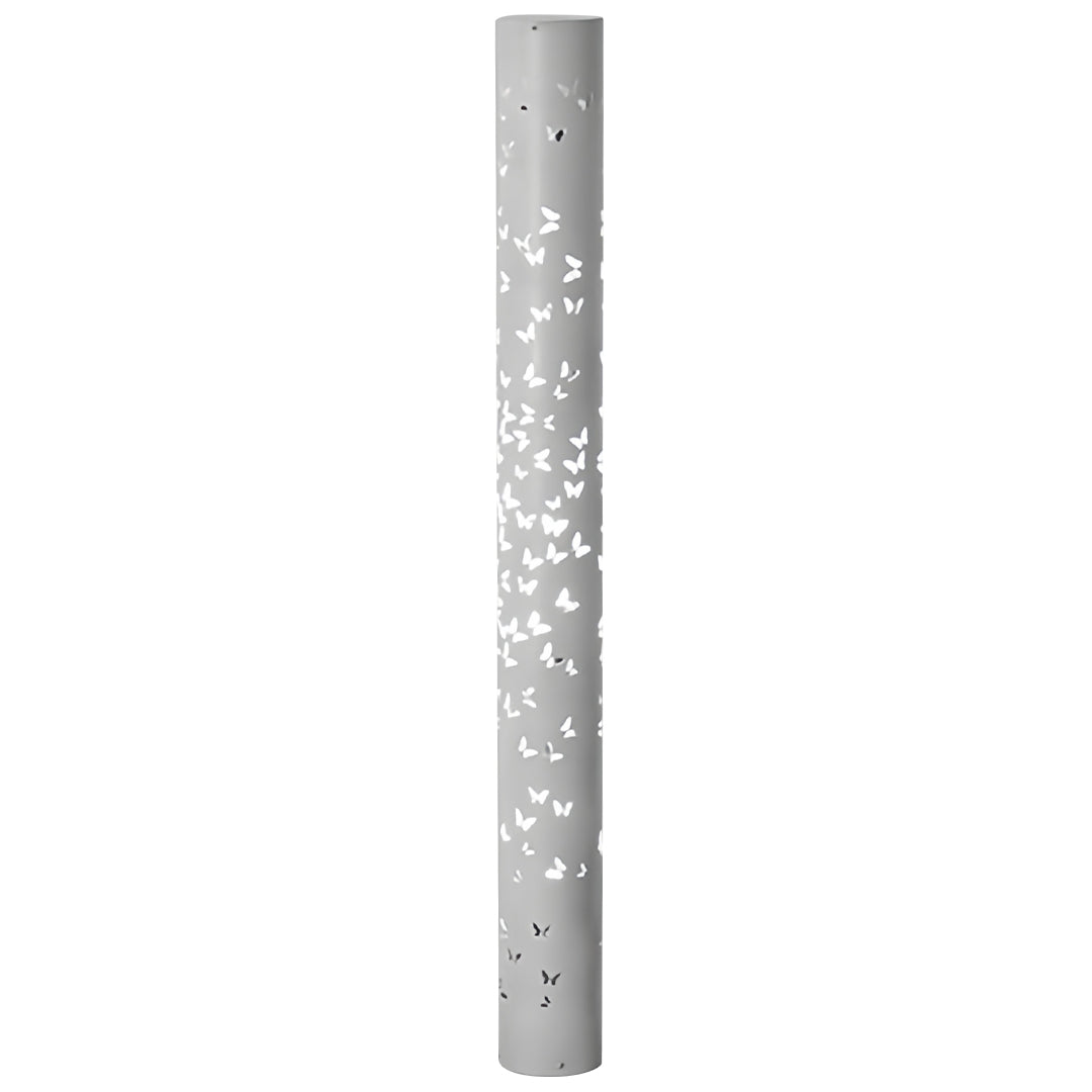 Sleek small black pendant light in brushed finish with minimalist perforated cylinder design