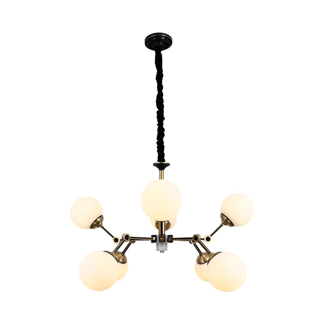 Bubble lighting chandeliers featuring a modern multi-globe design with elegant brass accents.