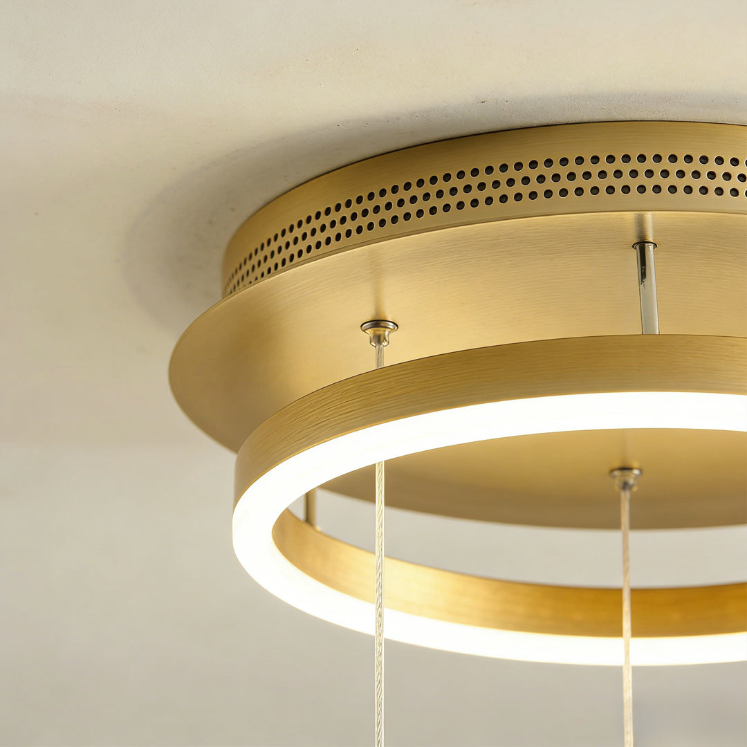 Detailed view of butterfly chandelier hanging wires and lighting structure.