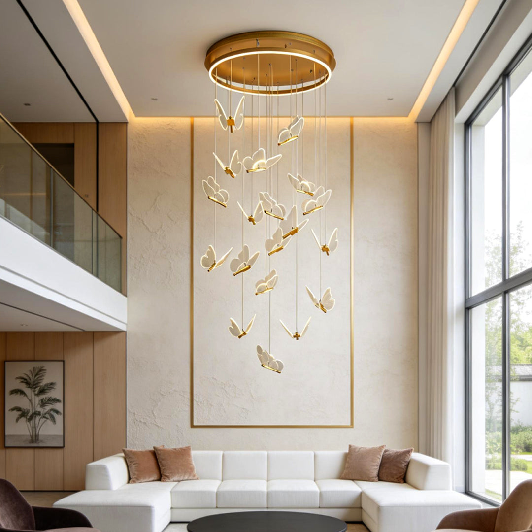 Luxury butterfly chandelier lighting a high ceiling living room with elegant hanging butterflies.