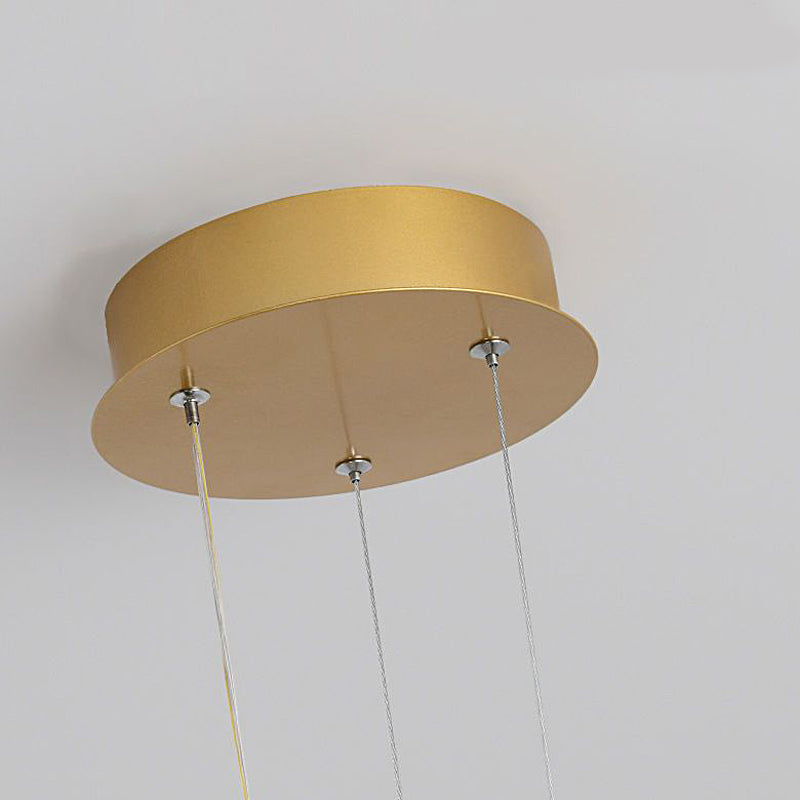 Butterfly pendant light displayed from below, showcasing detailed craftsmanship.