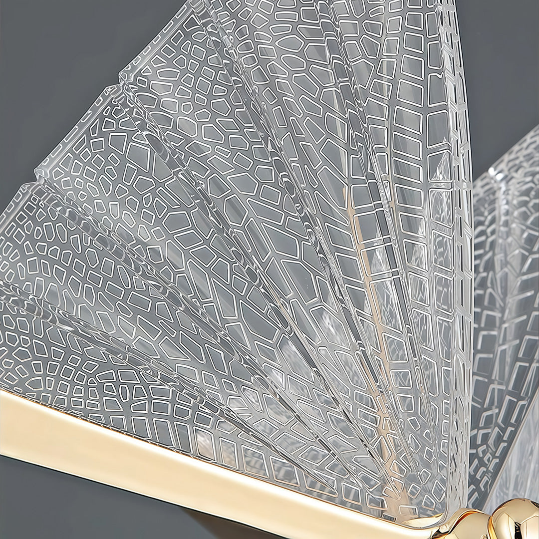 Close-up of textured glass wings on butterfly pendant light.