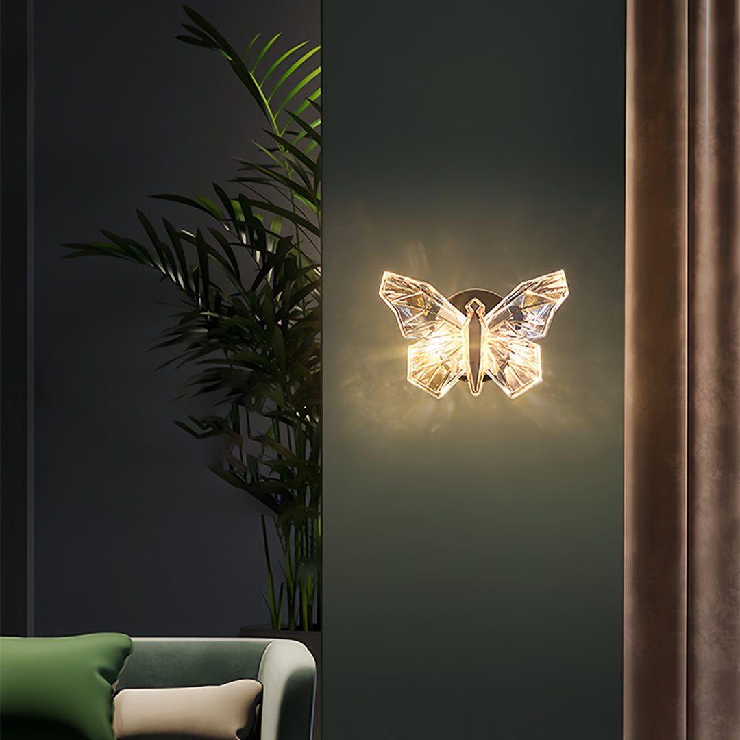 Butterfly wall light installation in contemporary bedroom with dark teal walls and modern furnishings