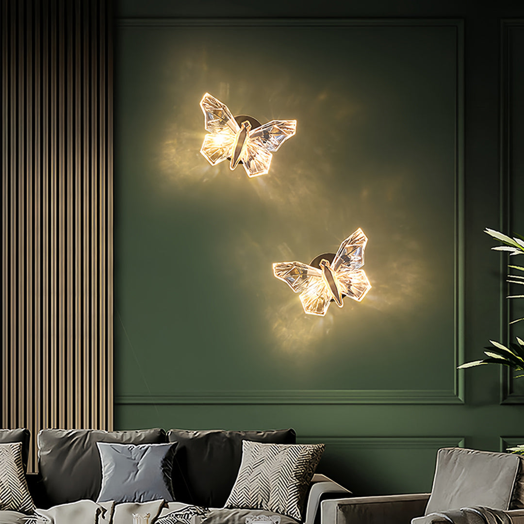 Butterfly wall light installation creating dramatic mood lighting in contemporary dark bedroom