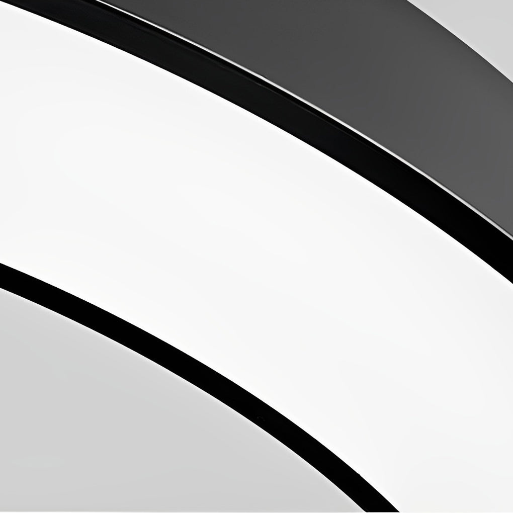 Close-up view of curved C shape pendant light showing smooth LED light surface.