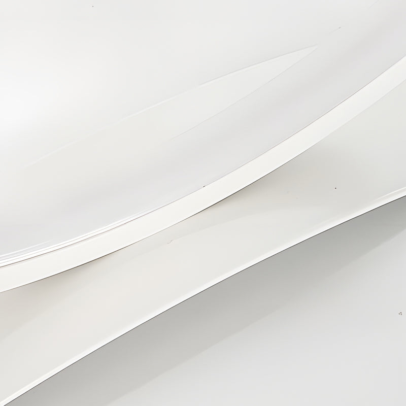 C shaped table lamp with a close-up of the sleek, minimalist base.