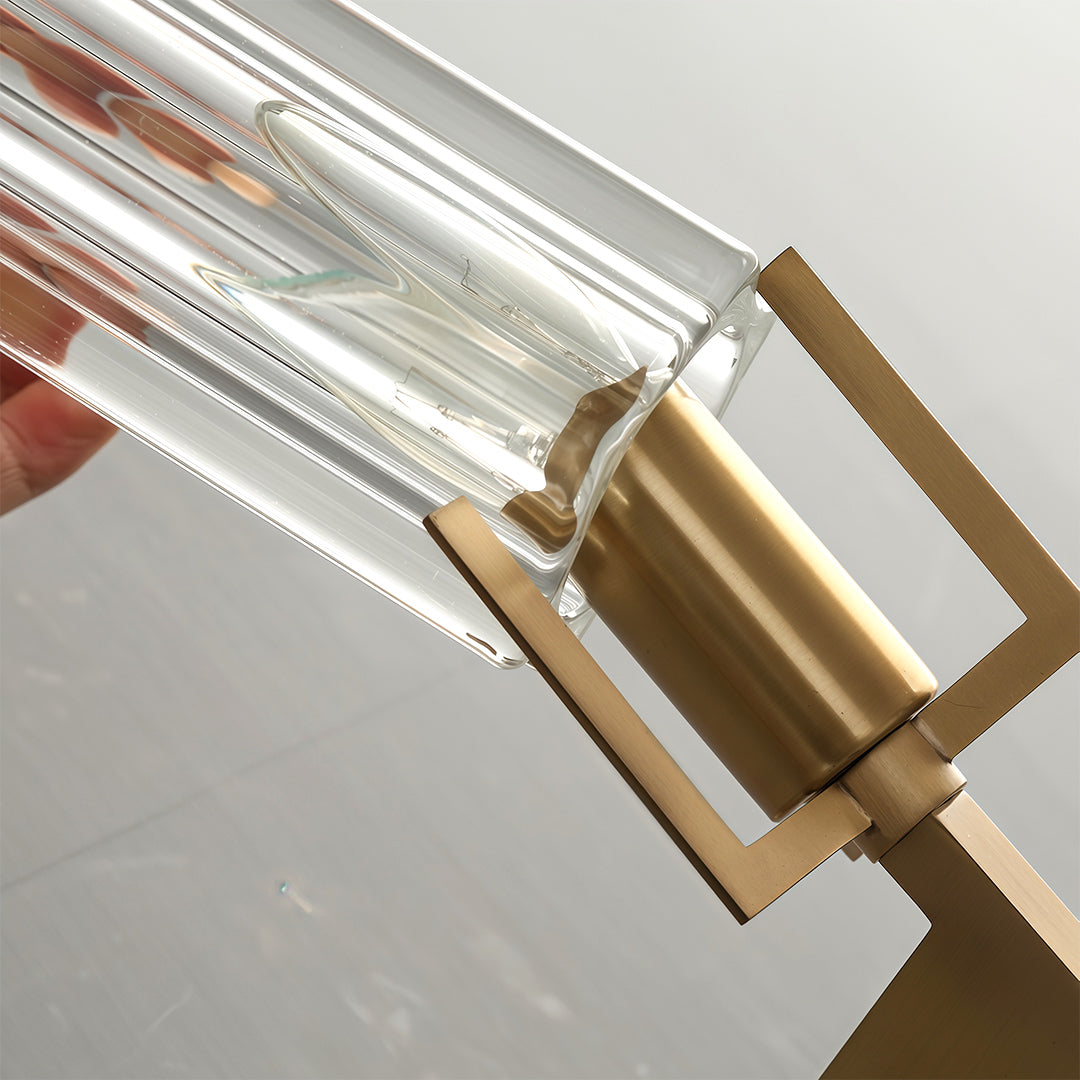 Modern luxury chandeliers detail view highlighting brass hardware and ribbed glass shade texture