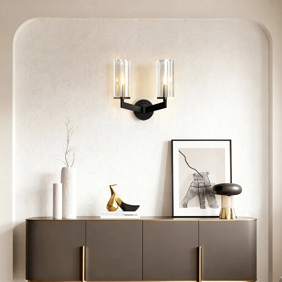 Modern luxury chandeliers illuminating elegant console area with modern art and minimalist design