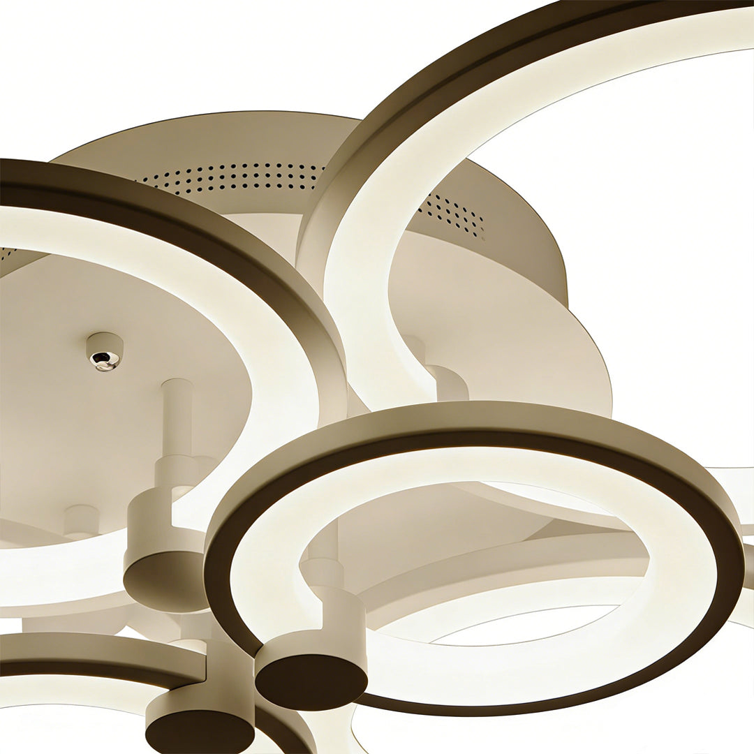 Ceiling canopy detail highlighting ventilation holes of energy efficient multi ring ceiling lights.