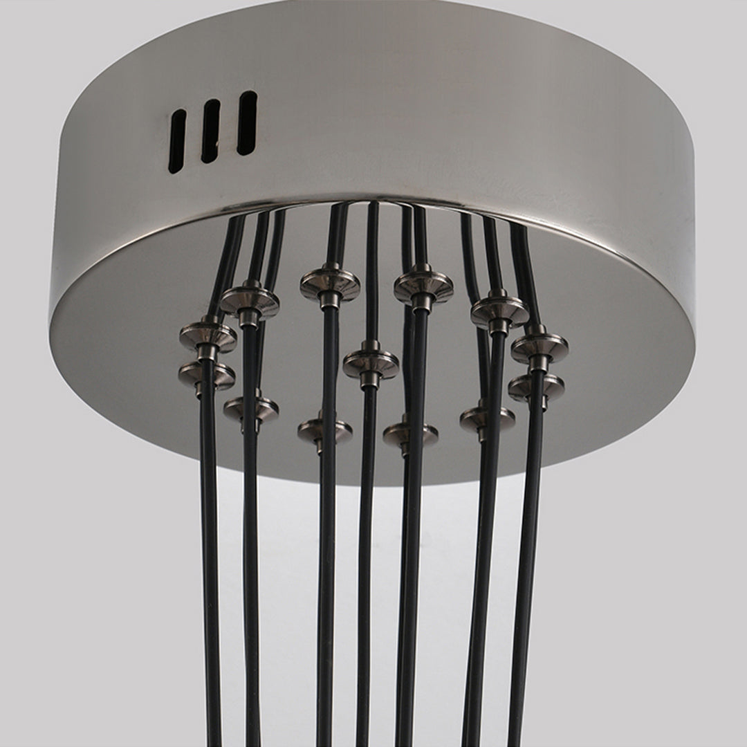 Installation view of multi light chandelier displaying black ceiling canopy with multiple pendant glass elements