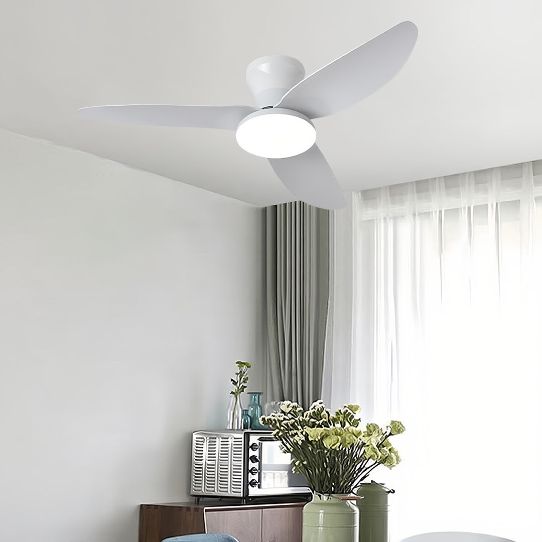 Ceiling fan with dimmer light in contemporary living room with white decor providing both cooling and illumination