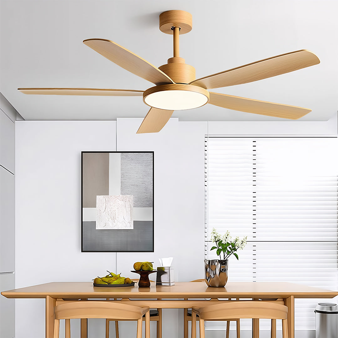 Ceiling fans with 5 lights creating ambient lighting in bright dining area with natural wood furniture