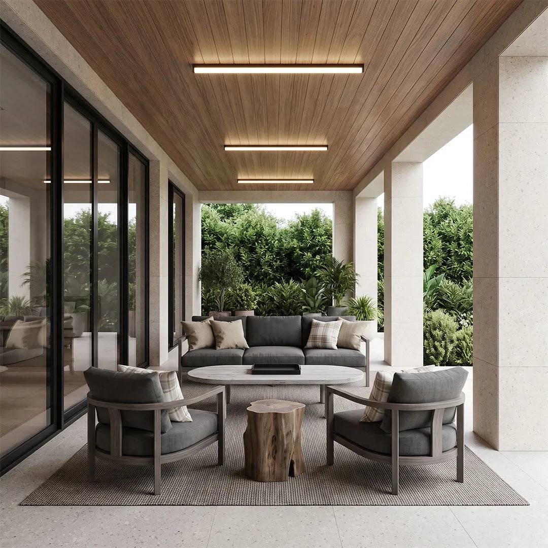 Ceiling linear lights providing warm overhead lighting above a covered patio seating area.