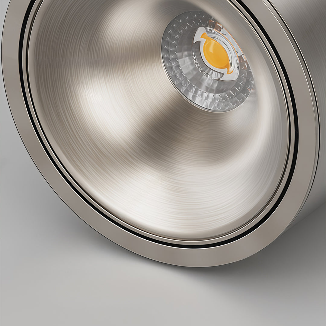Ceiling spotlight close-up showing precision reflector and high-performance LED light source.