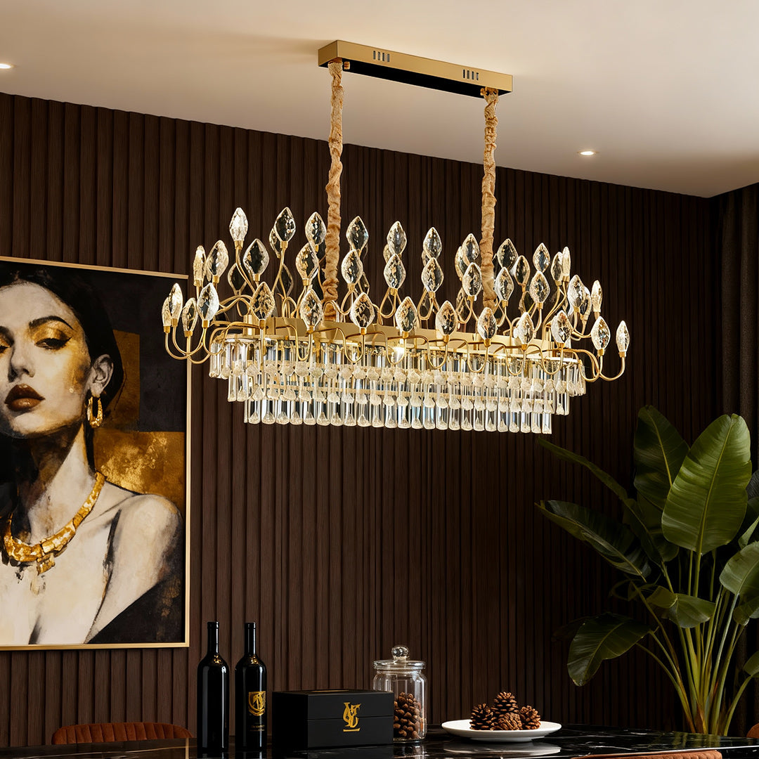 Gold ceramic crystal led chandelier hanging above a luxury dining table.