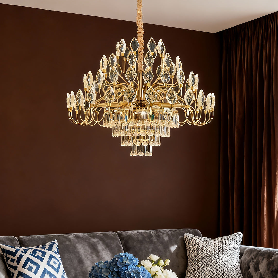 Gold ceramic crystal led chandelier with artistic arms above a living room.