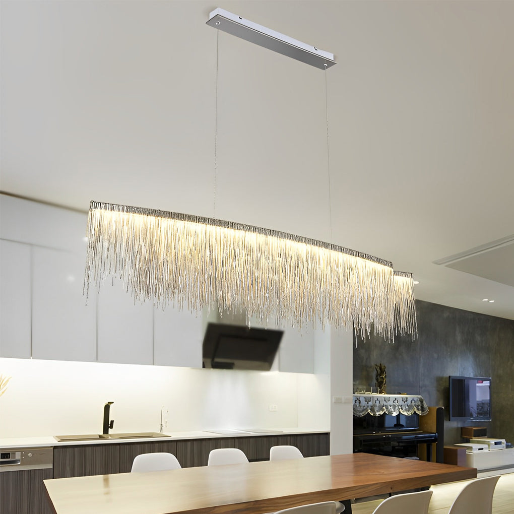 Chain tassel chandelier with a close-up of its cascading gold tassels.