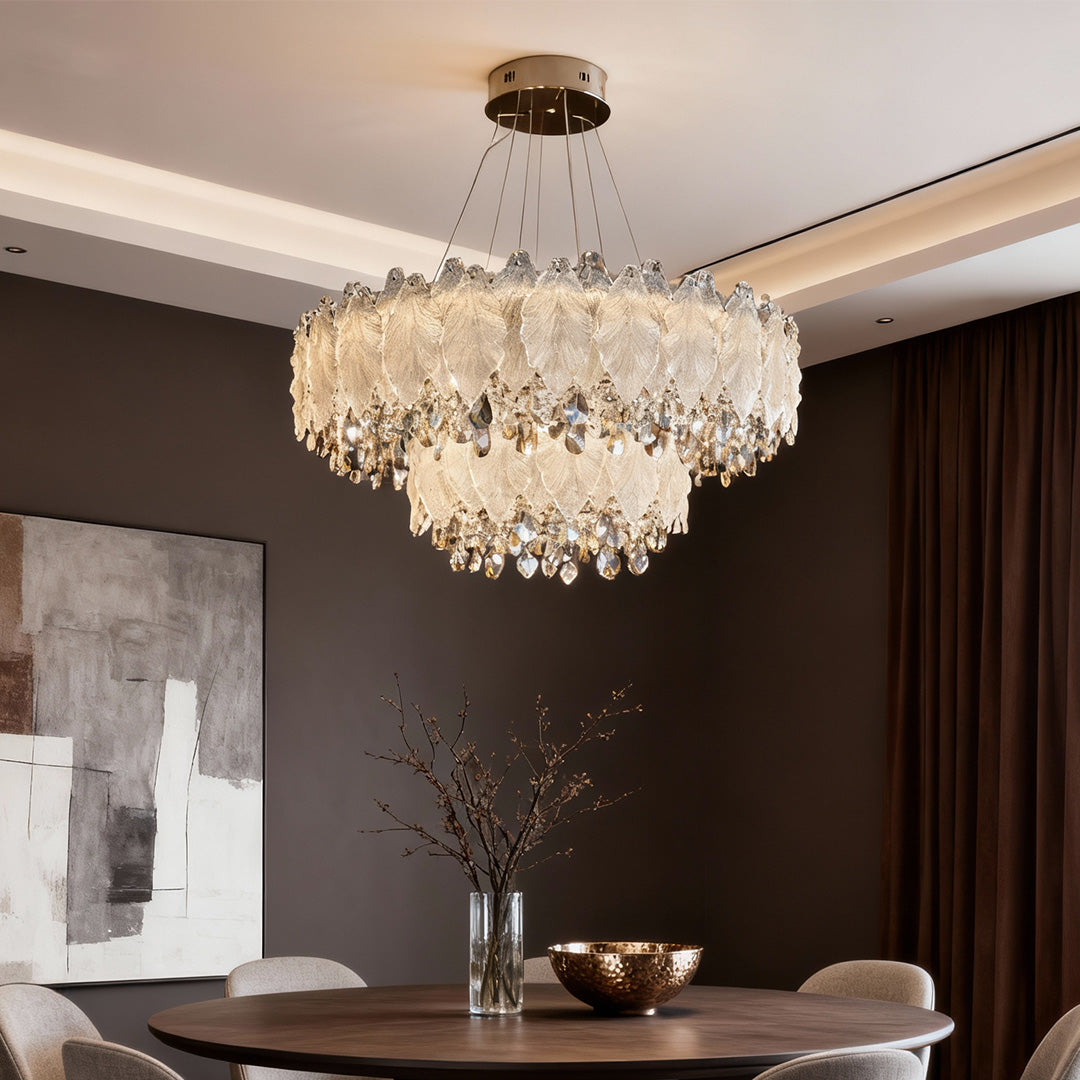 Champagne crystal country French chandelier glowing in warm dining atmosphere.
