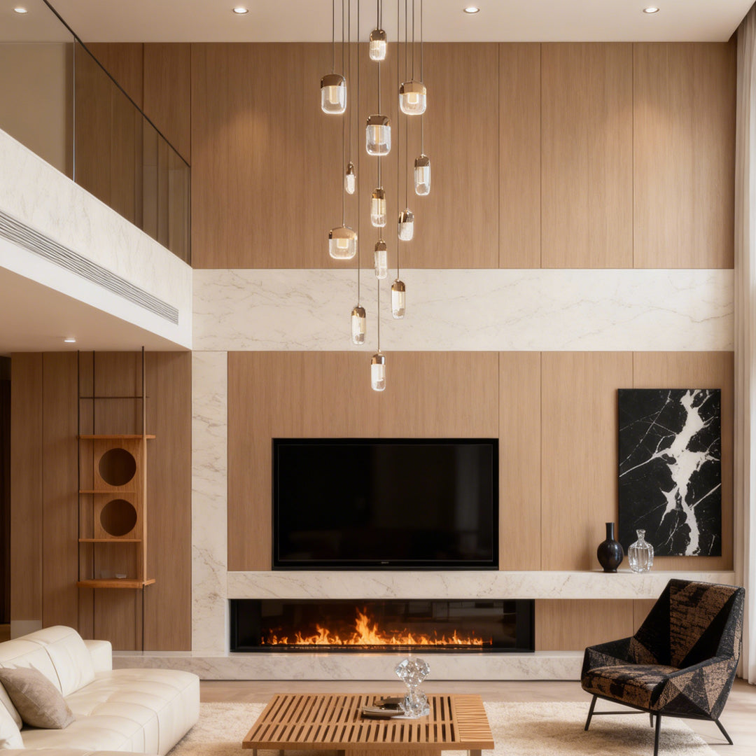 Chandelier for staircase creating focal point in double-height living space with wood accents and minimalist fireplace