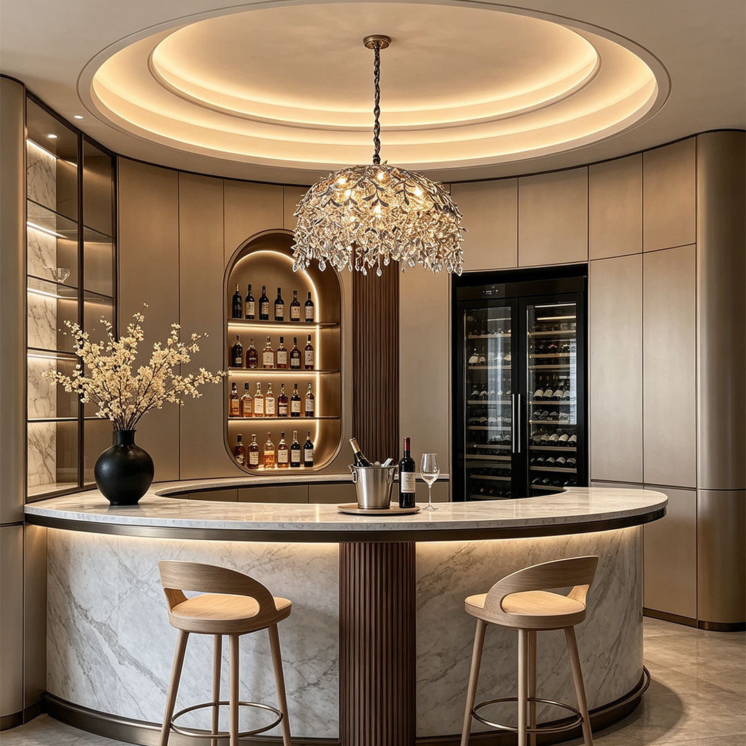 Chandelier with crystal displayed above a marble kitchen island in a luxurious modern interior.