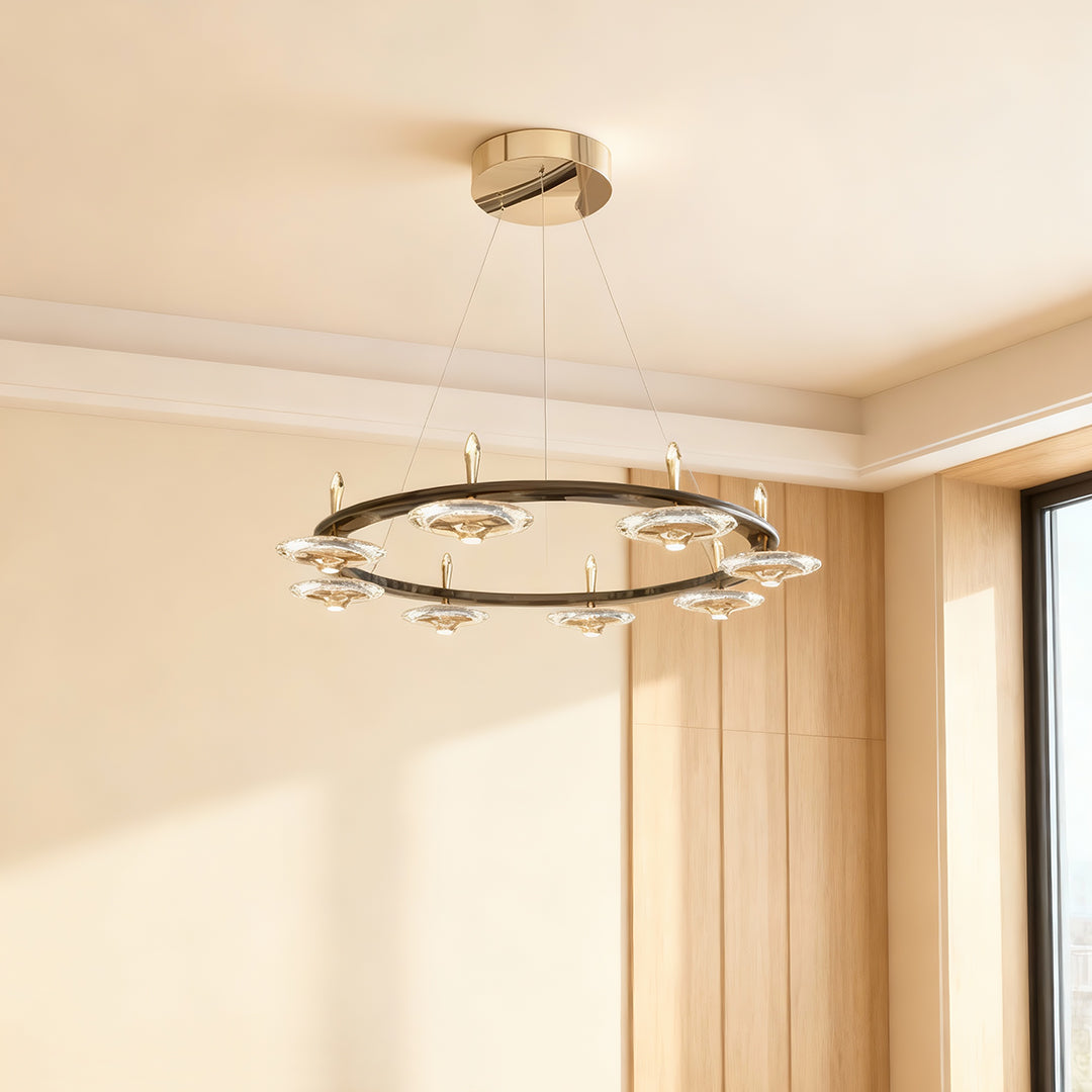 Chandelier with round crystals providing ambient lighting in hallway with natural wood doors and minimalist aesthetic