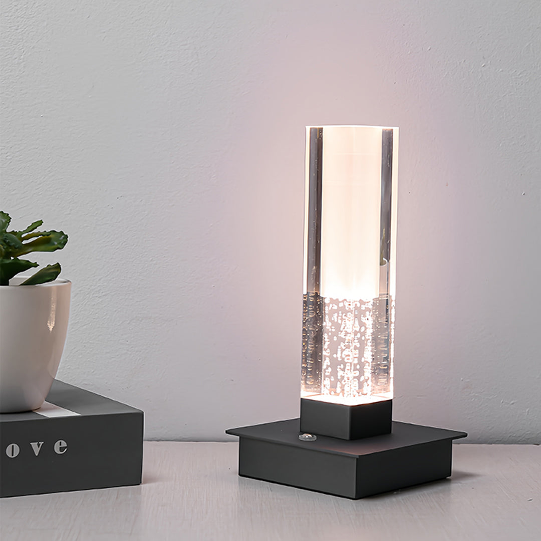 Stylish small black pendant light in charcoal finish creating ambient lighting with square base design