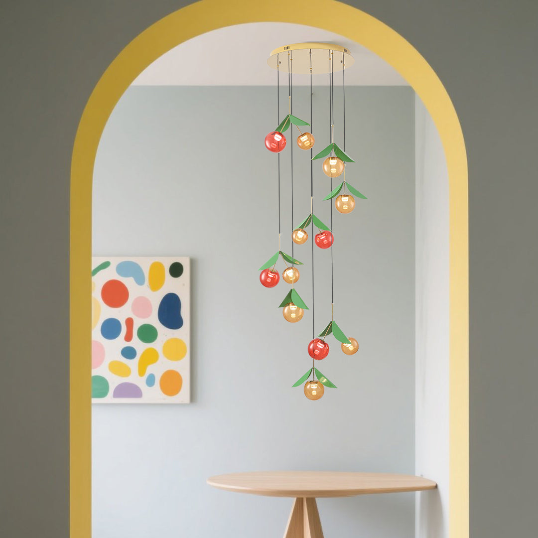 Cherry-inspired pendant lighting flowing through multi-level interior space with green accent walls and contemporary design