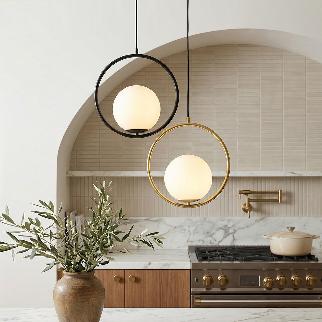Chic Round Frame Pendant light pair with opal globes in a modern kitchen with an arched wall.