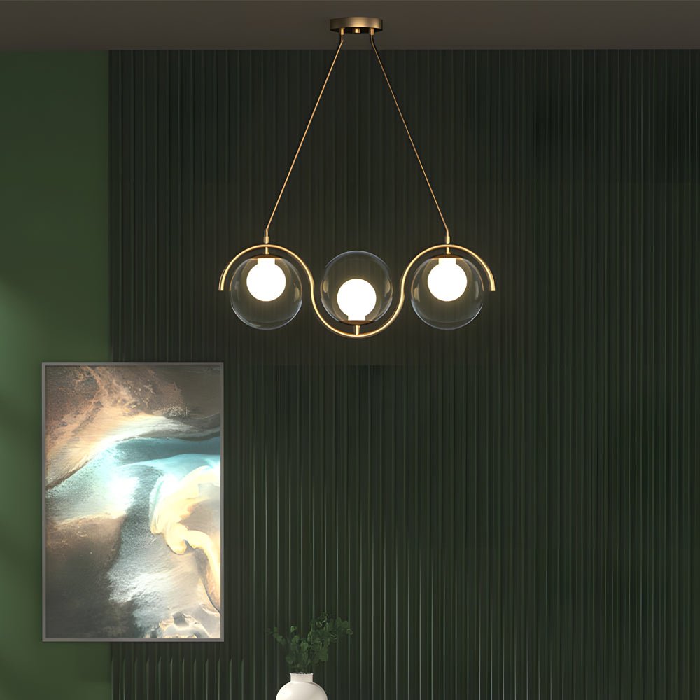 Chic glass ball linear chandelier with white spherical lights and delicate gold fixtures for an elegant look.