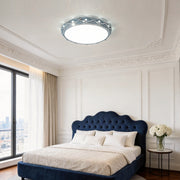 Childs ceiling light installed in a bright kids bedroom with modern decor.