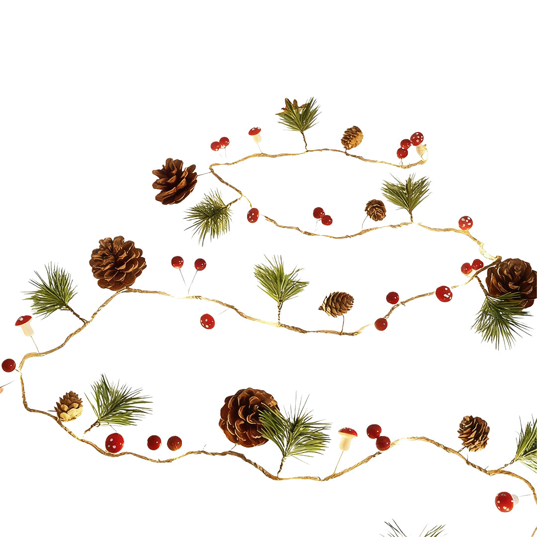Warm white Christmas LED string lights with pinecones, branches, and red berry decorations laid out in a layered tree shape.