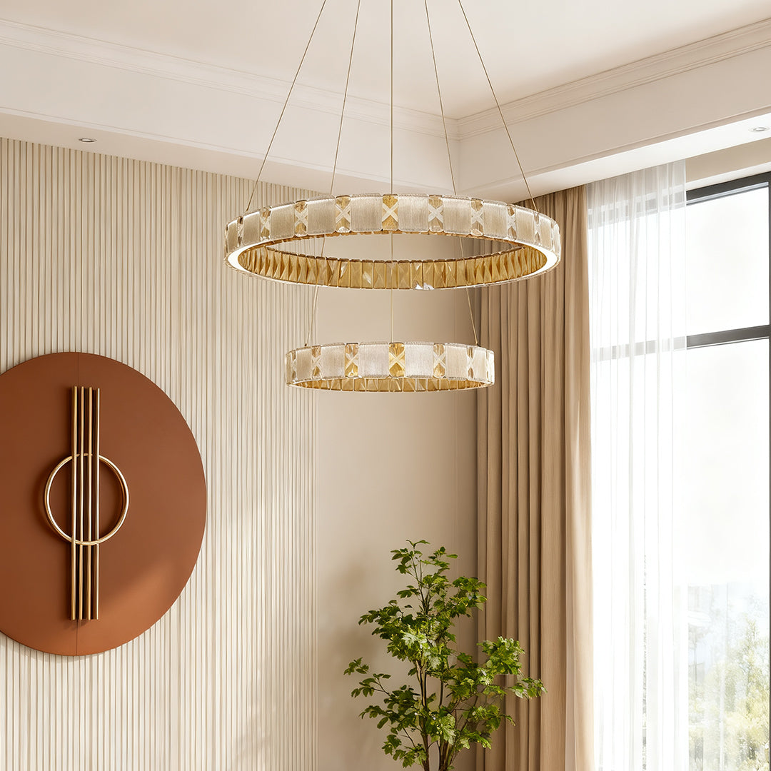 Chrome chandeliers installed in luxury dining room with warm ambient crystal illumination