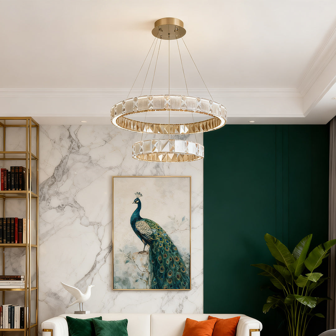 Chrome chandeliers creating sophisticated atmosphere in upscale residential dining and living space