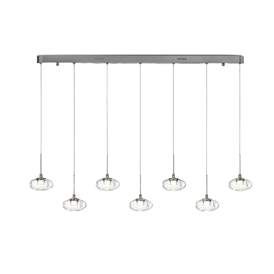 Contemporary multi light pendant lighting with chrome finish featuring four glass shades in linear canopy design