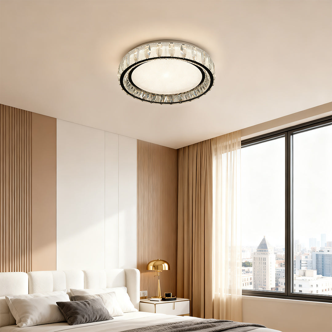 Chrome flush mount light in a contemporary bedroom, creating a serene and sophisticated ambiance.