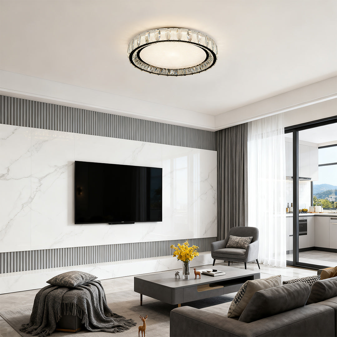 Chrome flush mount light in a modern living space with large windows, offering a stylish focal point.