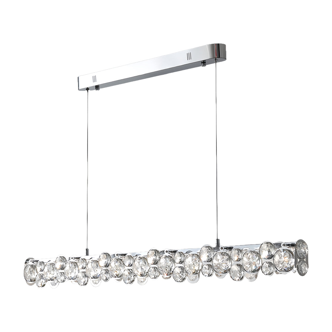 Chrome finish linear silver pendant light with large faceted bubble crystal accents, designed for a modern dining room.