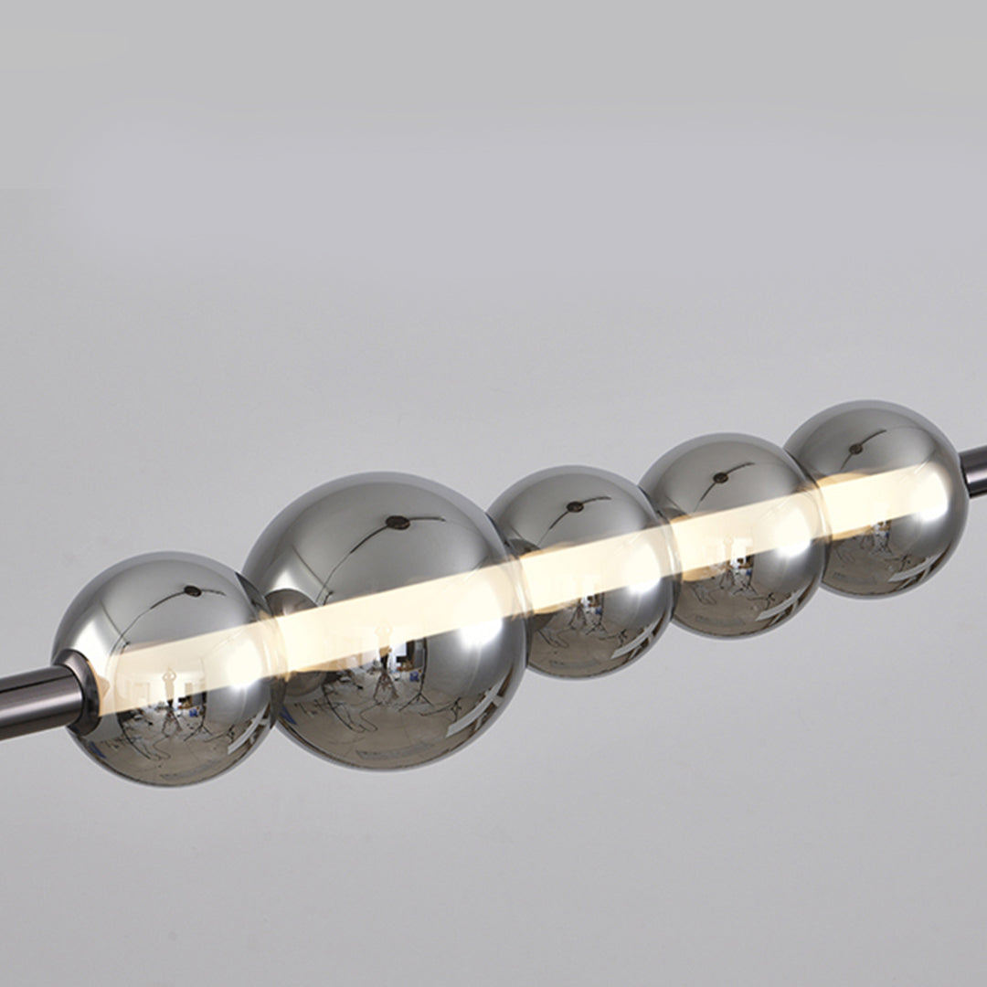 Elegant silver pendant light for kitchen island with reflective chrome spheres creating stunning overhead illumination