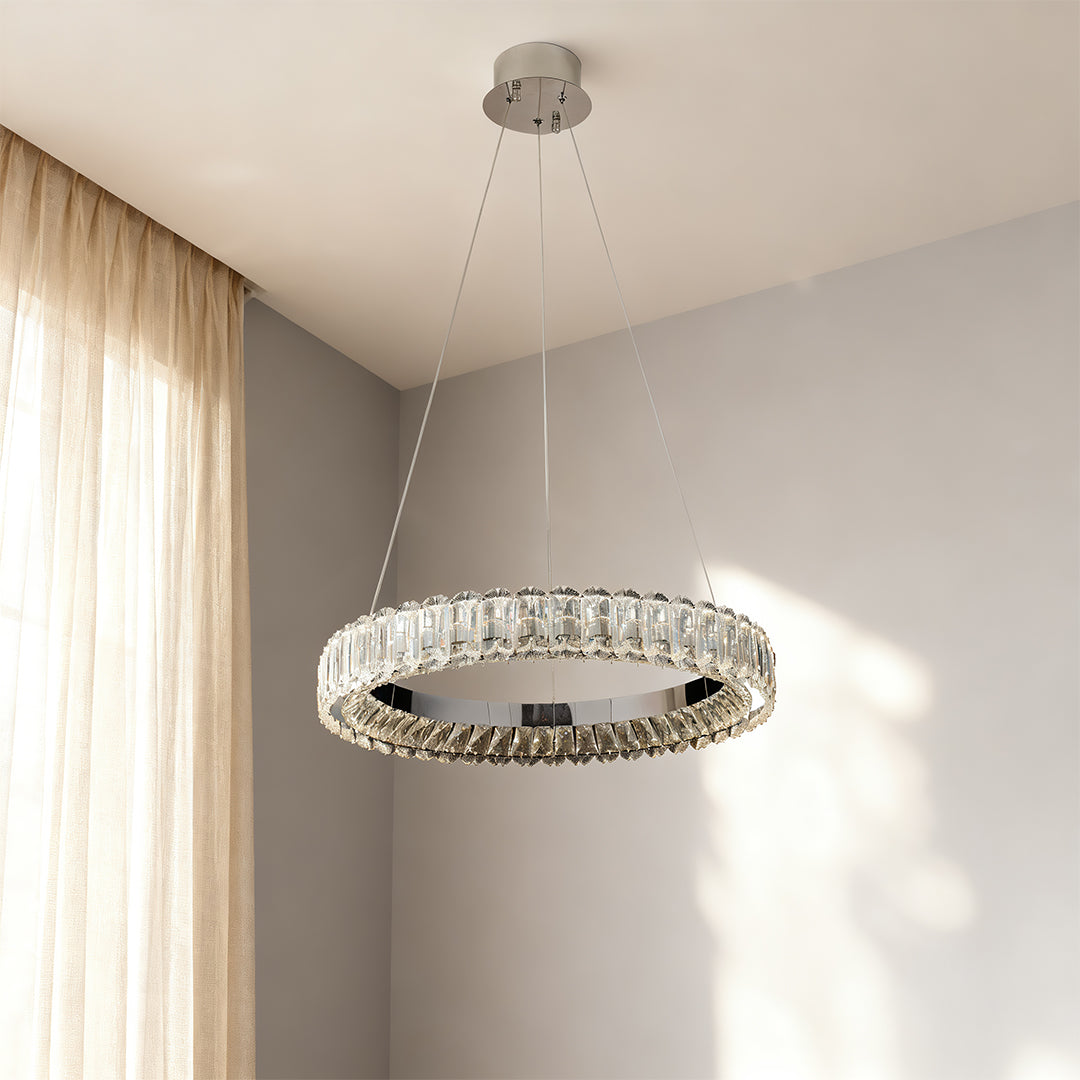 Circle chandelier hanging in a modern hallway, providing a bright and welcoming atmosphere.