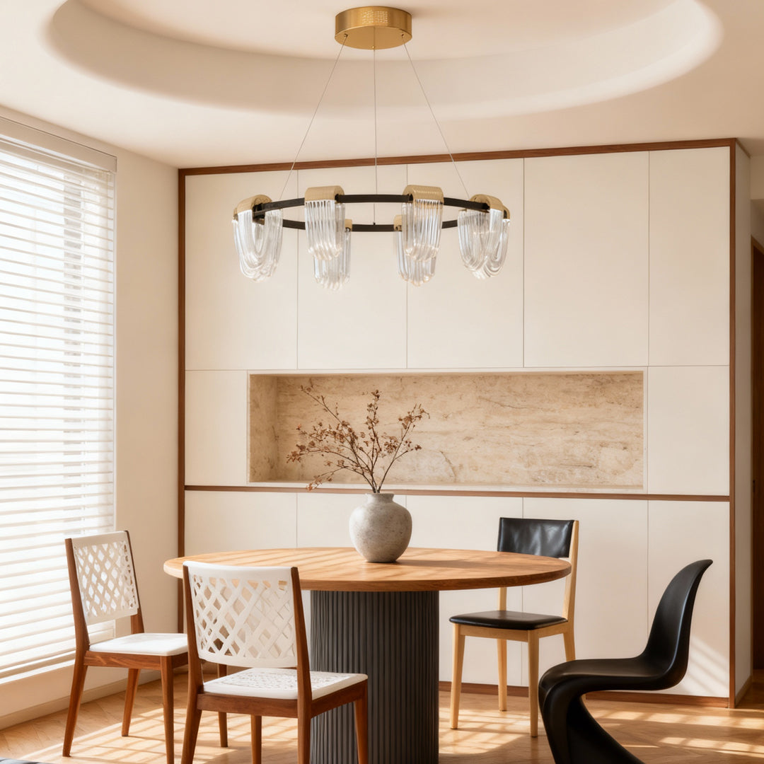 Contemporary circular chandelier modern design illuminating a bright dining space with natural tones.