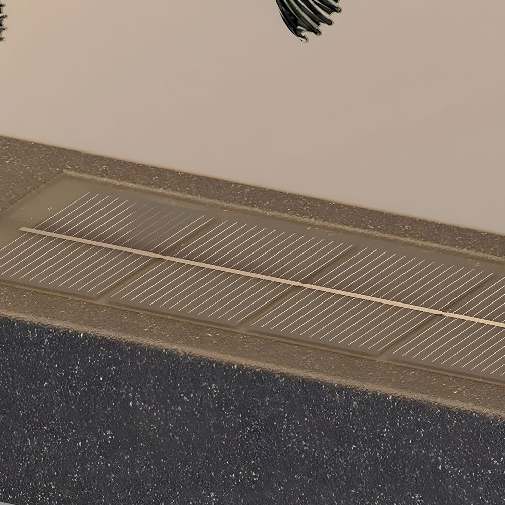 Architectural detail showing modern wall-mounted circular light fixture with integrated ventilation grilles