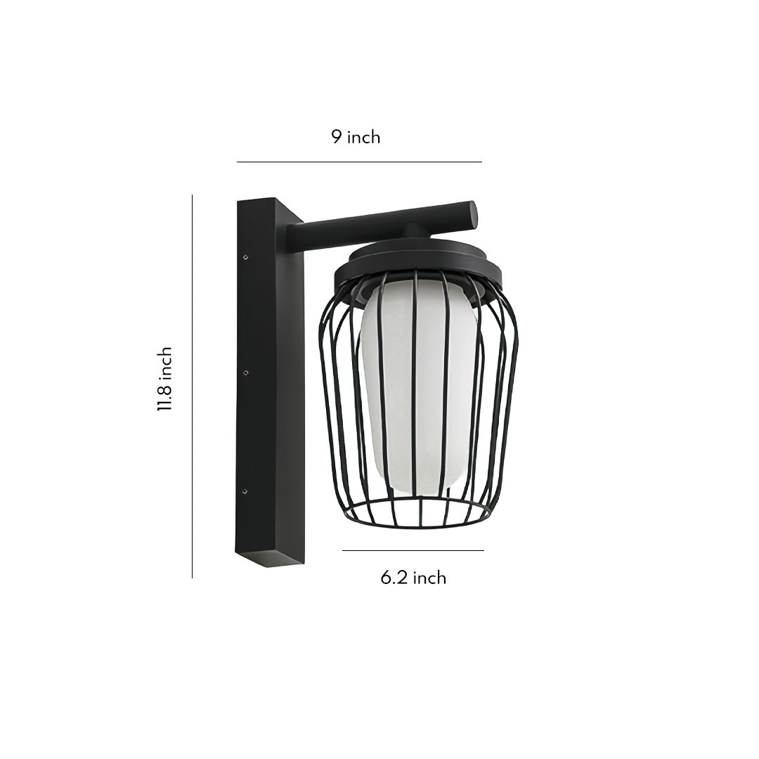 Classic black outdoor wall lantern sconce with clear glass shade and decorative metal cage design.