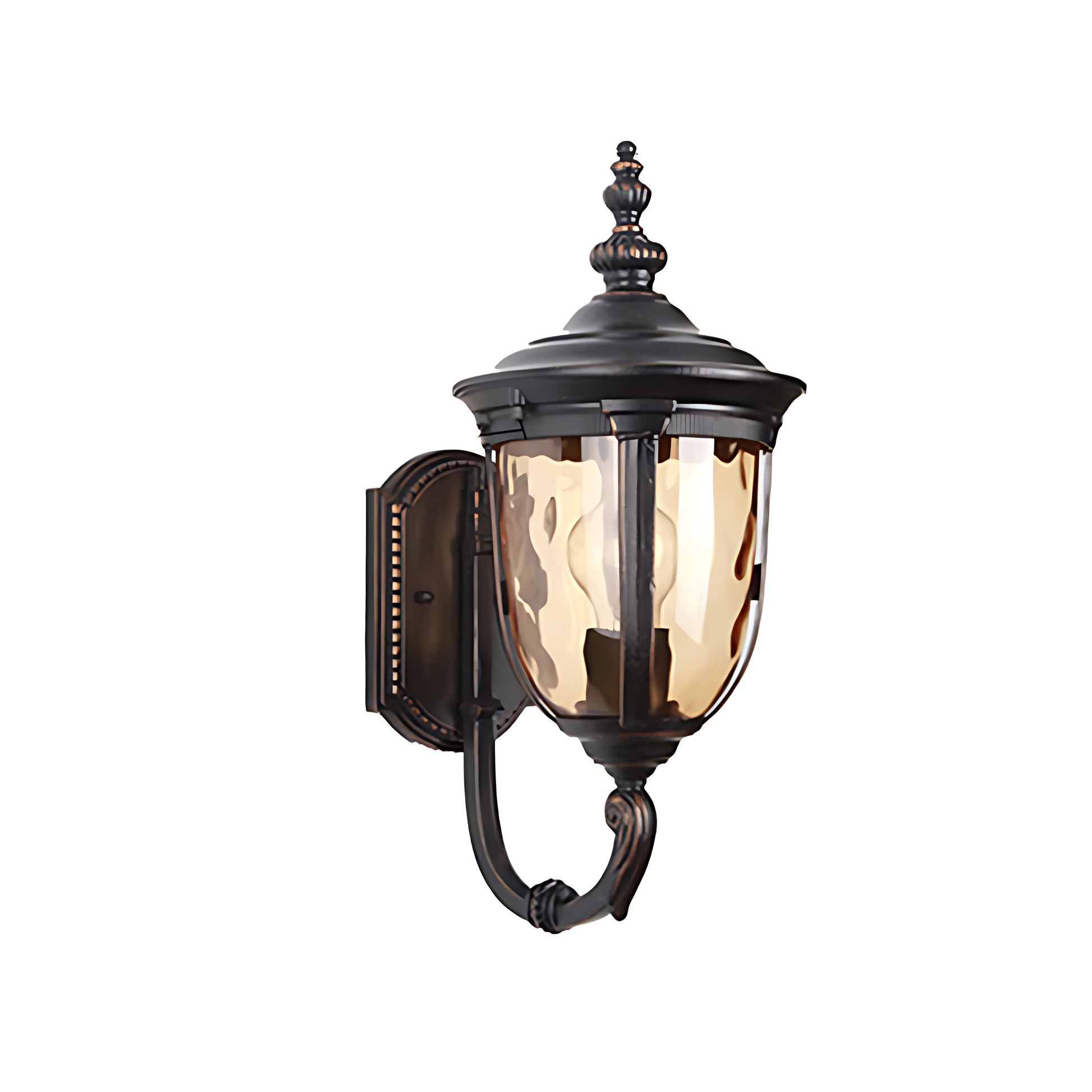 Classic bronze outdoor lantern with amber glass creating atmospheric evening lighting