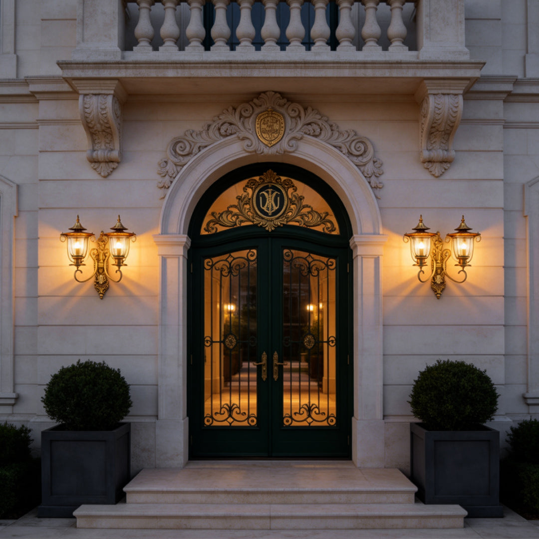 Classic architectural entrance with glowing Copper Outdoor Wall Sconces mounted on a sophisticated stone exterior wall.