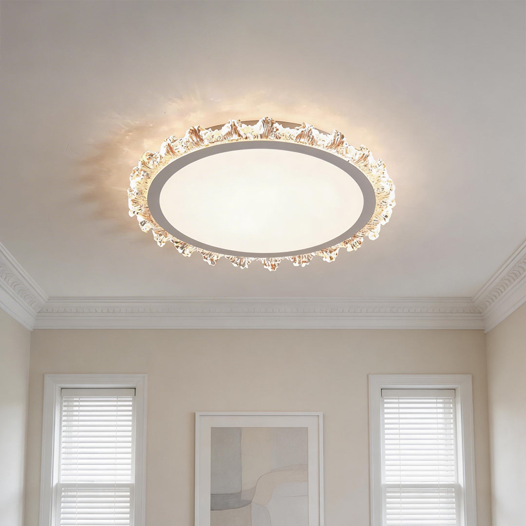Beautiful white round led ceiling light with crystal edges illuminating a classic home hallway.