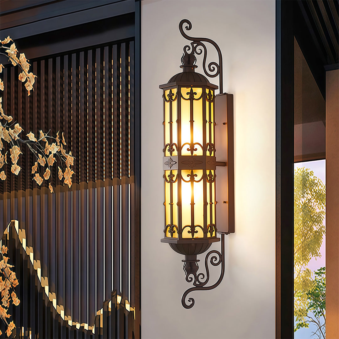 Classic LED wall sconce with elegant design, mounted on a neutral exterior wall.