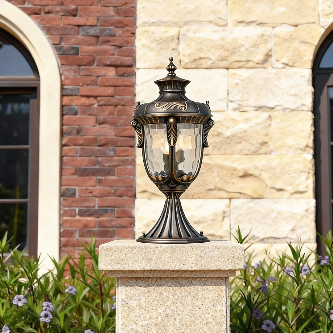 Classic outdoor pillar lights for house mounted on a brick wall, creating a welcoming ambiance.