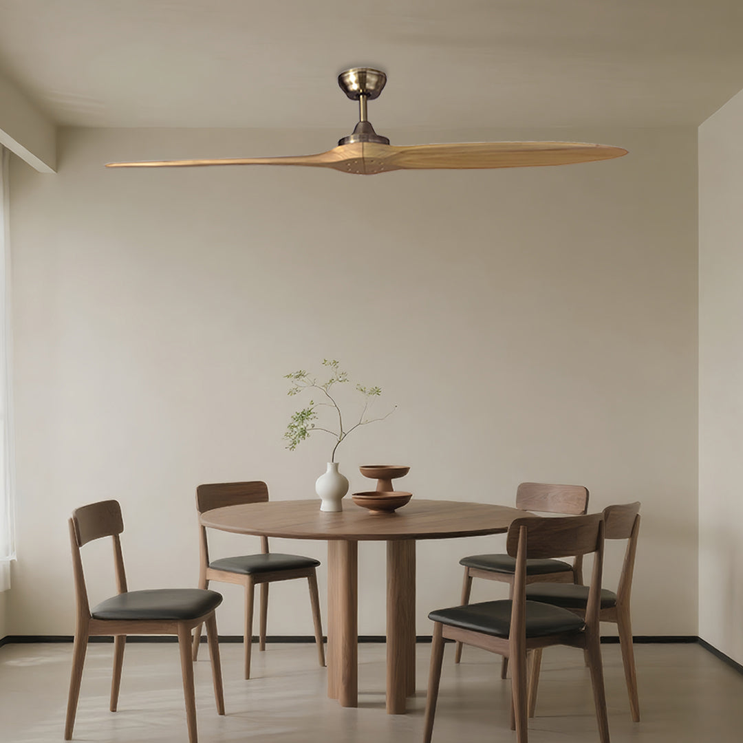 Classic wooden remote controlled ceiling fan in warm dining space with wooden furniture